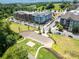 Aerial view of neighborhood with a tiered amphitheater-style park and nearby apartment buildings at 956 Herrons Ferry Rd, Rock Hill, SC 29730