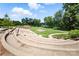 Outdoor amphitheater offering a unique gathering space with views of the river and surrounding greenery at 956 Herrons Ferry Rd, Rock Hill, SC 29730