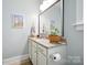Bathroom featuring granite vanity, sink and bright natural light at 956 Herrons Ferry Rd, Rock Hill, SC 29730