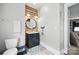 Charming bathroom featuring a vanity with modern fixtures, a decorative wood accent wall and cute whale decor at 956 Herrons Ferry Rd, Rock Hill, SC 29730