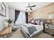 Comfortable bedroom with natural wood accent wall, ceiling fan and large window at 956 Herrons Ferry Rd, Rock Hill, SC 29730