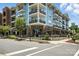 Charming blue condo building with Tony's restaurant at the corner, offering a vibrant urban lifestyle at 956 Herrons Ferry Rd, Rock Hill, SC 29730