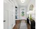 Beautiful foyer with hardwood floors, stylish decor, and a glimpse of the front entrance at 956 Herrons Ferry Rd, Rock Hill, SC 29730
