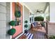Inviting front porch with a cozy seating area and stylish decorations, perfect for relaxation at 956 Herrons Ferry Rd, Rock Hill, SC 29730