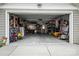 Open garage revealing organized storage of tools and recreation equipment at 956 Herrons Ferry Rd, Rock Hill, SC 29730