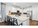 Bright kitchen featuring granite countertops, stainless steel appliances and a kitchen island with bar stool seating at 956 Herrons Ferry Rd, Rock Hill, SC 29730