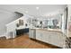 Spacious kitchen with granite island, stainless steel appliances, wood floors and easy access to the living room at 956 Herrons Ferry Rd, Rock Hill, SC 29730