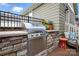Outdoor kitchen with built-in grill and stone surround, offering a perfect space for outdoor cooking at 956 Herrons Ferry Rd, Rock Hill, SC 29730