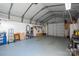 The property includes a clean and well-maintained garage with ample storage space at 1005 Noles Dr, Mount Holly, NC 28120