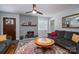 Cozy living room with hardwood floors, fireplace, and stylish decor at 1005 Noles Dr, Mount Holly, NC 28120