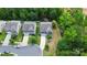 An aerial view showcases this home's position amidst lush greenery and manicured lawns at 10304 Ebbets Rd, Charlotte, NC 28273