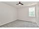 Neutral bedroom with carpeting and a window at 10304 Ebbets Rd, Charlotte, NC 28273