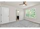 Bedroom featuring carpet and an ensuite bathroom with a double sink at 10304 Ebbets Rd, Charlotte, NC 28273