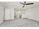 Large bonus room with carpeting, multiple doors, and view of the stairwell at 10304 Ebbets Rd, Charlotte, NC 28273