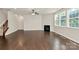 Bright living room features hardwood floors, a fireplace and lots of natural light at 10304 Ebbets Rd, Charlotte, NC 28273