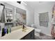 This bathroom offers a classic vanity, a shower and tub combination, and ample storage at 106 Abbey Cir, Salisbury, NC 28147