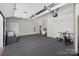 This garage boasts epoxy floors, a door to the outside, and ample room for storage at 106 Abbey Cir, Salisbury, NC 28147