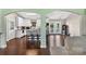 Open kitchen with an island and seating with views of the outdoor deck at 106 Abbey Cir, Salisbury, NC 28147
