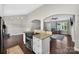 Open kitchen with island seating and updated stainless steel appliances at 106 Abbey Cir, Salisbury, NC 28147