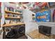 This laundry room features wooden shelves and countertops, and modern, high-efficiency appliances at 106 Abbey Cir, Salisbury, NC 28147