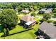 A well-maintained backyard features an enclosed patio, lush grass, and a black fence at 1083 Fox Chase Dr, Newton, NC 28658