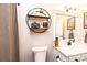 Modern bathroom featuring a sleek vanity with decor, a mirror, and a toilet at 1083 Fox Chase Dr, Newton, NC 28658