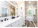 Modern bathroom with dual sinks, granite countertops, and separate tub and shower at 1083 Fox Chase Dr, Newton, NC 28658