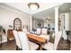 Elegant dining room with hardwood floors and ample natural light at 1083 Fox Chase Dr, Newton, NC 28658