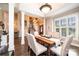 Open dining room with hardwood floors and view of the front entry at 1083 Fox Chase Dr, Newton, NC 28658