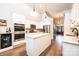 Updated kitchen featuring white cabinets, an island, and stainless steel appliances at 1083 Fox Chase Dr, Newton, NC 28658