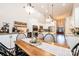 Spacious eat-in kitchen with white cabinets, granite counters, and stainless appliances at 1083 Fox Chase Dr, Newton, NC 28658