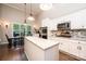 Bright eat-in kitchen with an island, stainless steel appliances, and lots of cabinet space at 1083 Fox Chase Dr, Newton, NC 28658