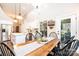 Bright kitchen with large island, stainless steel appliances, and backyard access at 1083 Fox Chase Dr, Newton, NC 28658