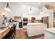Bright eat-in kitchen with white cabinetry, an island, and stainless steel appliances at 1083 Fox Chase Dr, Newton, NC 28658