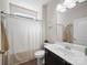 Bathroom with modern fixtures, tile flooring, and a neutral shower curtain at 117 Autumn Mist Rd, Statesville, NC 28677