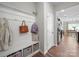 Inviting mudroom with built-in bench, storage cubbies, and convenient access to the kitchen at 117 Autumn Mist Rd, Statesville, NC 28677