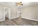 Spacious bedroom featuring new hardwood floors, and access to both the bathroom and kitchen at 1234 Goodnight Ln, Kannapolis, NC 28081