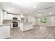 Bright kitchen with stainless steel appliances, granite countertops, and center island at 1234 Goodnight Ln, Kannapolis, NC 28081