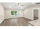 Open-concept space with hardwood floors and ample natural light at 1234 Goodnight Ln, Kannapolis, NC 28081