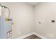 The utility room features connections for a washer and dryer and a State water heater at 1234 Goodnight Ln, Kannapolis, NC 28081
