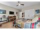 Bedroom with fan, tv, desk and sports decor at 1399 Verdict Ridge Dr, Denver, NC 28037