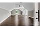 Spacious bonus room featuring hardwood floors, a ceiling fan, natural lighting and neutral paint at 1399 Verdict Ridge Dr, Denver, NC 28037