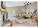 Spacious living room with fireplace, modern decor, and large windows at 1399 Verdict Ridge Dr, Denver, NC 28037