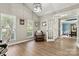 Office featuring hardwood floors, two windows and view of formal dining room at 1399 Verdict Ridge Dr, Denver, NC 28037