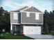 Charming two-story home with stone accents and a well-manicured lawn creates great curb appeal at 1418 31St Ne St, Conover, NC 28613