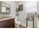 Bathroom featuring granite countertop, wood vanity and updated fixtures at 206 Mitchell Ave, Salisbury, NC 28144