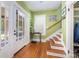 Inviting foyer with hardwood floors, a staircase, and a charming entrance at 206 Mitchell Ave, Salisbury, NC 28144