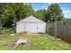Garage with dual doors and backyard views including playset at 206 Mitchell Ave, Salisbury, NC 28144