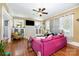 Comfortable living room featuring hardwood floors, a decorative fireplace, and cozy seating at 206 Mitchell Ave, Salisbury, NC 28144
