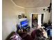 Comfortable living room with a cozy seating area, fireplace, and decorative accents at 211 Oak Dr, Shelby, NC 28150